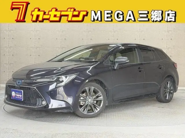 2021 Toyota Corolla Touring 1.8 Hybrid WxB Black Van for sale, Japanese used car export - photo 1 of 20 | GULJI TRADERS