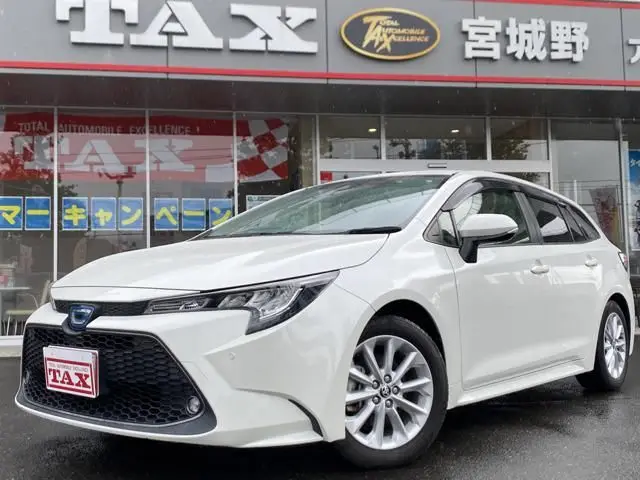 2021 Toyota Corolla Touring 1.8 Hybrid S - photo 1 2021 Toyota Corolla Touring 1.8 Hybrid S Pearl Van for sale, Japanese used car export - photo 1 of 17 | GULJI TRADERS