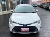 2021 Toyota Corolla Touring 1.8 Hybrid S Pearl Van for sale, Japanese used car export - photo 3 of 17 | GULJI TRADERS
