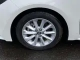 2021 Toyota Corolla Touring 1.8 Hybrid S Pearl Van for sale, Japanese used car export - photo 5 of 17 | GULJI TRADERS