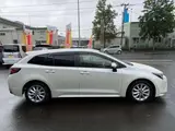 2021 Toyota Corolla Touring 1.8 Hybrid S Pearl Van for sale, Japanese used car export - photo 9 of 17 | GULJI TRADERS