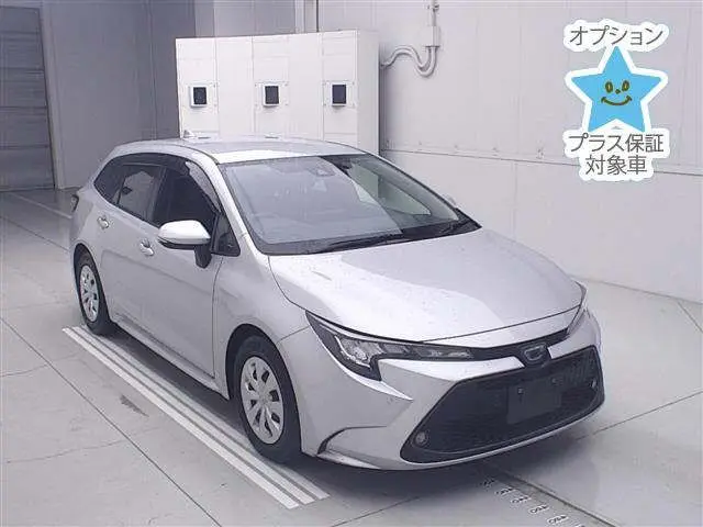 2021 Toyota Corolla Touring Touring Hybrid G-X Plus Safety Sense - photo 1 2021 Toyota Corolla Touring Touring Hybrid G-X Plus Safety Sense Silver Van for sale, Japanese used car export - photo 1 of 12 | GULJI TRADERS