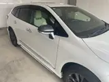 2021 Toyota Corolla Touring 4WD HYBRID WXB White Van for sale, Japanese used car export - photo 23 of 24 | GULJI TRADERS