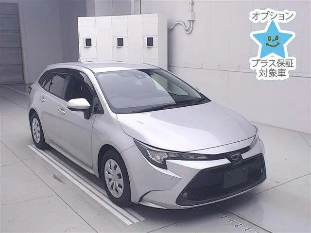 2021 Toyota Corolla Touring Touring Hybrid G-X Plus - photo 1 2021 Toyota Corolla Touring Touring Hybrid G-X Plus Silver Van for sale, Japanese used car export - photo 1 of 12 | GULJI TRADERS