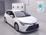 2021 Toyota Corolla Touring 4WD Hybrid S Van for sale, Japanese used car export - photo 1 of 12 | GULJI TRADERS