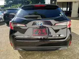 2021 Toyota Corolla Touring Hybrid Double By Other Van for sale, Japanese used car export - photo 6 of 9 | GULJI TRADERS
