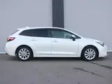 2021 Toyota Corolla Touring Hybrid S Safety Sense Pearl Van for sale, Japanese used car export - photo 4 of 9 | GULJI TRADERS