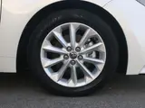 2021 Toyota Corolla Touring Hybrid S Safety Sense Pearl Van for sale, Japanese used car export - photo 9 of 9 | GULJI TRADERS