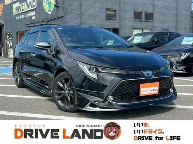 2021 Toyota Corolla Touring 1.8 Hybrid WxB - photo 1 2021 Toyota Corolla Touring 1.8 Hybrid WxB Black Van for sale, Japanese used car export - photo 1 of 9 | GULJI TRADERS