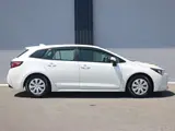 2021 Toyota Corolla Touring G-X Safety Sense BSM/RCT Pearl Van for sale, Japanese used car export - photo 4 of 9 | GULJI TRADERS