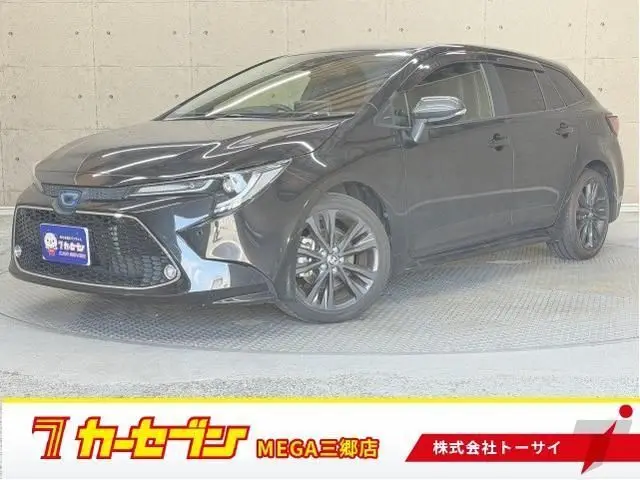2021 Toyota Corolla Touring Hybrid Double By - photo 1 2021 Toyota Corolla Touring Hybrid Double By Black Van for sale, Japanese used car export - photo 1 of 9 | GULJI TRADERS