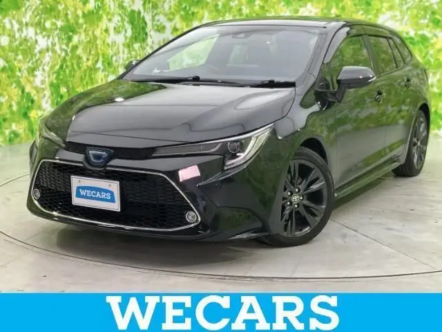 2021 Toyota Corolla Touring 4WD Hybrid Double Bar - photo 1 2021 Toyota Corolla Touring 4WD Hybrid Double Bar Black Van for sale, Japanese used car export - photo 1 of 9 | GULJI TRADERS