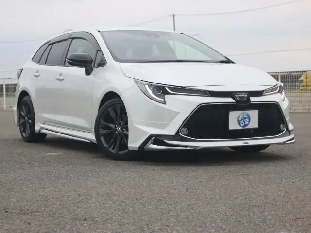 2021 Toyota Corolla Touring WxB Modellista Aero Kit 9-inch Pearl Van for sale, Japanese used car export - photo 1 of 9 | GULJI TRADERS