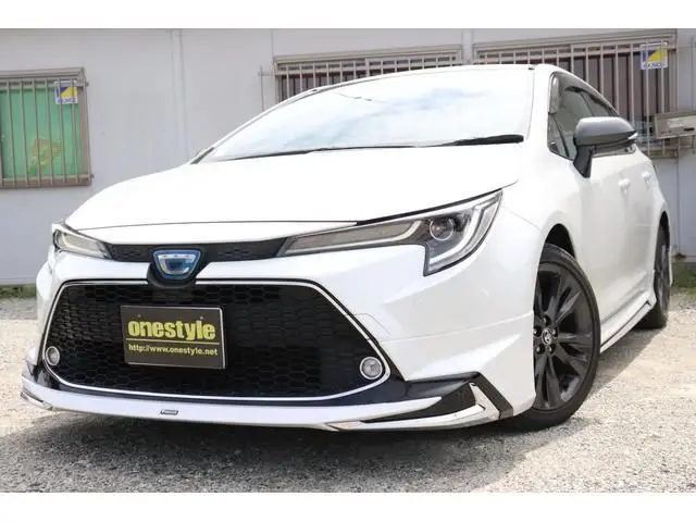 2021 Toyota Corolla Touring Hybrid Double By - photo 1 2021 Toyota Corolla Touring Hybrid Double By Pearl Van for sale, Japanese used car export - photo 1 of 9 | GULJI TRADERS