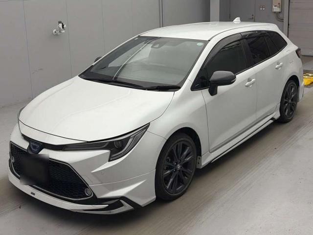 2021 Toyota Corolla Touring Hybrid Van for sale, Japanese used car export - photo 1 of 9 | GULJI TRADERS