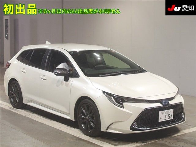 2021 Toyota Corolla Touring Hybrid - photo 1 2021 Toyota Corolla Touring Hybrid Van for sale, Japanese used car export - photo 1 of 9 | GULJI TRADERS
