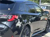 2022 Toyota Corolla Touring Hybrid Double By B 50 Million Edition Black Van for sale, Japanese used car export - photo 63 of 80 | GULJI TRADERS
