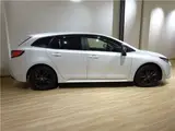 2022 Toyota Corolla Touring Hybrid W×B 4WD Pearl Van for sale, Japanese used car export - photo 10 of 42 | GULJI TRADERS
