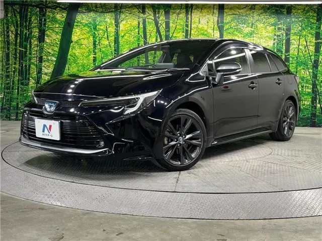 2022 Toyota Corolla Touring Hybrid Double By Black Van for sale, Japanese used car export - photo 1 of 30 | GULJI TRADERS