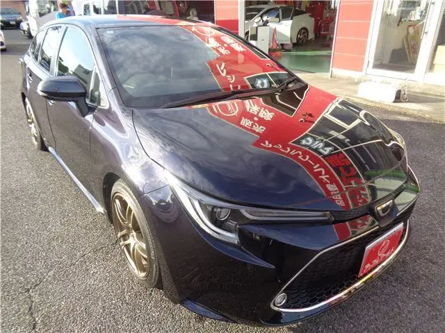 2022 Toyota Corolla Touring Double Bye - photo 1 2022 Toyota Corolla Touring Double Bye Purple Van for sale, Japanese used car export - photo 1 of 48 | GULJI TRADERS