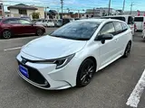 2022 Toyota Corolla Touring Hybrid Double By White Van for sale, Japanese used car export - photo 1 of 70 | GULJI TRADERS