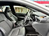 2022 Toyota Corolla Touring Hybrid Double By White Van for sale, Japanese used car export - photo 35 of 70 | GULJI TRADERS
