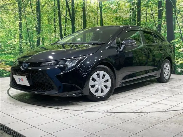 2022 Toyota Corolla Touring Hybrid G-X Plus Black Van for sale, Japanese used car export - photo 1 of 30 | GULJI TRADERS