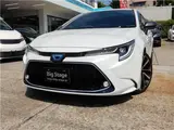 2022 Toyota Corolla Touring Hybrid Double WxB ★ 9-inch display ★ Pearl Van for sale, Japanese used car export - photo 1 of 58 | GULJI TRADERS
