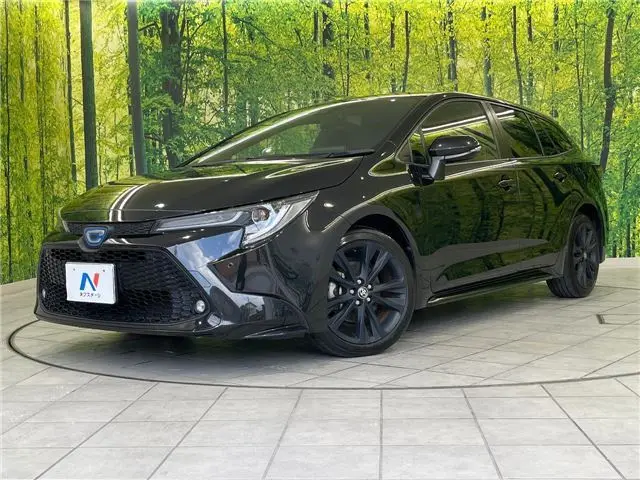 2022 Toyota Corolla Touring Hybrid Double WxB 50 Million Edition - photo 1 2022 Toyota Corolla Touring Hybrid Double WxB 50 Million Edition Black Van for sale, Japanese used car export - photo 1 of 30 | GULJI TRADERS
