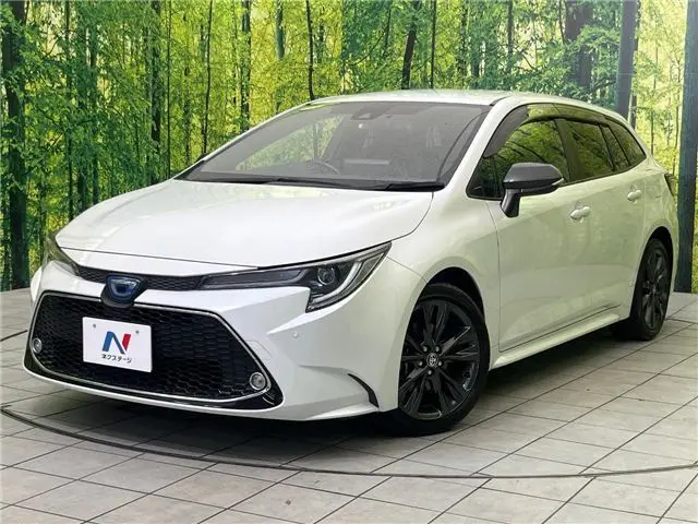 2022 Toyota Corolla Touring Hybrid Double By - photo 1 2022 Toyota Corolla Touring Hybrid Double By Pearl Van for sale, Japanese used car export - photo 1 of 30 | GULJI TRADERS