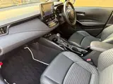 2022 Toyota Corolla Touring 1.8 Hybrid WxB White Van for sale, Japanese used car export - photo 20 of 25 | GULJI TRADERS