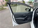 2022 Toyota Corolla Touring Hybrid WxB Pearl Van for sale, Japanese used car export - photo 31 of 44 | GULJI TRADERS