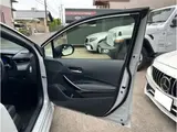 2022 Toyota Corolla Touring Hybrid WxB Pearl Van for sale, Japanese used car export - photo 32 of 44 | GULJI TRADERS