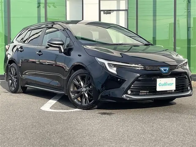 2022 Toyota Corolla Touring Hybrid Double By Black Van for sale, Japanese used car export - photo 1 of 24 | GULJI TRADERS