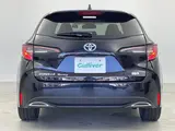 2022 Toyota Corolla Touring Hybrid Double By Black Van for sale, Japanese used car export - photo 23 of 24 | GULJI TRADERS