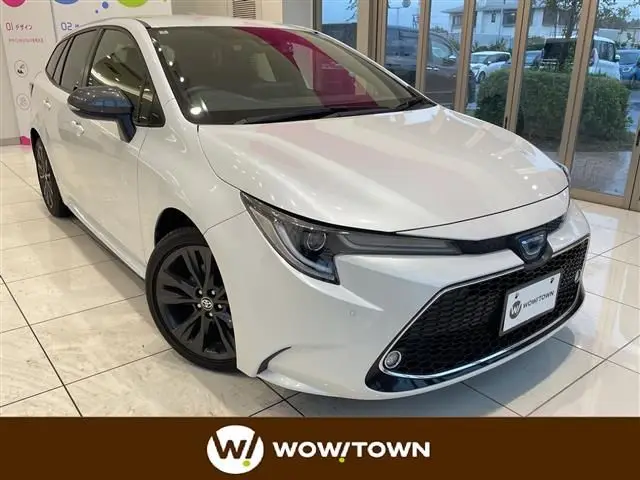 2022 Toyota Corolla Touring Hybrid Double By - photo 1 2022 Toyota Corolla Touring Hybrid Double By White Van for sale, Japanese used car export - photo 1 of 24 | GULJI TRADERS