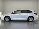 2022 Toyota Corolla Touring Hybrid S Van for sale, Japanese used car export - photo 20 of 23 | GULJI TRADERS