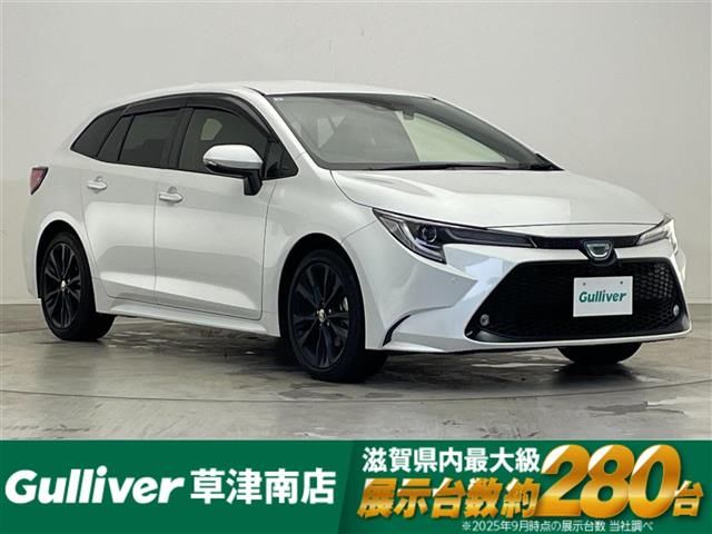 2022 Toyota Corolla Touring Hybrid Van for sale, Japanese used car export - photo 1 of 24 | GULJI TRADERS