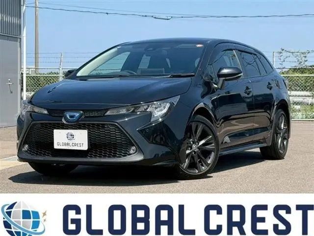 2022 Toyota Corolla Touring 1.8HV S Genuine 9-inch DA Navigation System Black Van for sale, Japanese used car export - photo 1 of 30 | GULJI TRADERS