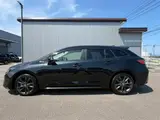 2022 Toyota Corolla Touring 1.8HV S Genuine 9-inch DA Navigation System Black Van for sale, Japanese used car export - photo 9 of 30 | GULJI TRADERS