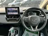 2022 Toyota Corolla Touring 1.8HV S Genuine 9-inch DA Navigation System Black Van for sale, Japanese used car export - photo 18 of 30 | GULJI TRADERS
