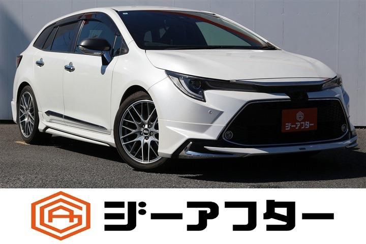 2022 Toyota Corolla Touring 1.8 HYBRID WxB - photo 1 2022 Toyota Corolla Touring 1.8 HYBRID WxB Van for sale, Japanese used car export - photo 1 of 30 | GULJI TRADERS
