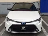 2022 Toyota Corolla Touring HYBRIDW×B 2WD White Van for sale, Japanese used car export - photo 4 of 24 | GULJI TRADERS
