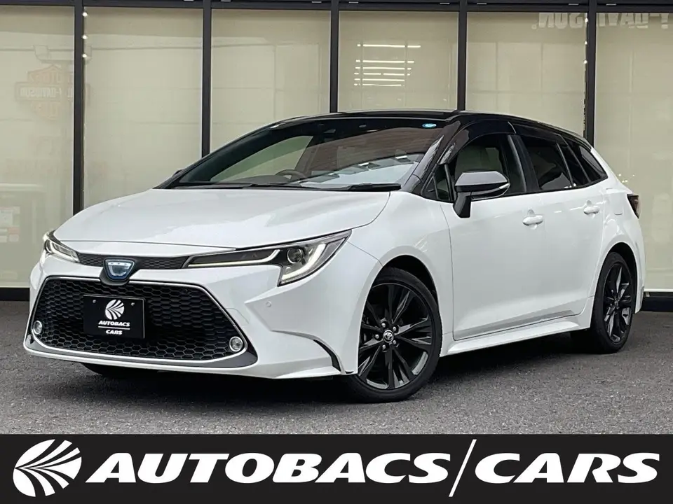 2022 Toyota Corolla Touring HYBRIDW×B 2WD White Van for sale, Japanese used car export - photo 1 of 21 | GULJI TRADERS