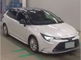 2022 Toyota Corolla Touring Hybrid S Pearl Van for sale, Japanese used car export - photo 1 of 6 | GULJI TRADERS
