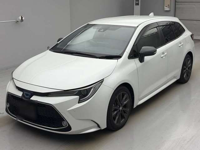 2022 Toyota Corolla Touring Hybrid 4WD Van for sale, Japanese used car export - photo 1 of 10 | GULJI TRADERS