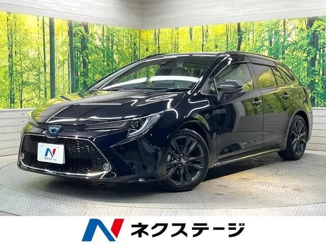 2022 Toyota Corolla Touring Hybrid Double By - photo 1 2022 Toyota Corolla Touring Hybrid Double By Black Van for sale, Japanese used car export - photo 1 of 9 | GULJI TRADERS