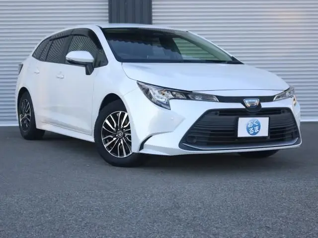 2022 Toyota Corolla Touring Hybrid G ​​Safety Sense Pearl Van for sale, Japanese used car export - photo 1 of 9 | GULJI TRADERS
