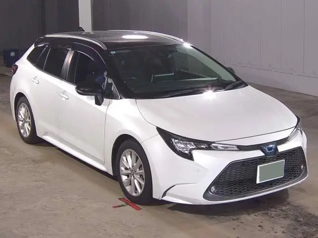 2022 Toyota Corolla Touring Hybrid S - photo 1 2022 Toyota Corolla Touring Hybrid S Pearl Van for sale, Japanese used car export - photo 1 of 6 | GULJI TRADERS