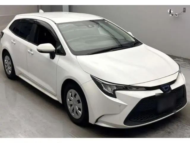 2022 Toyota Corolla Touring Special Edition Hybrid G-X - photo 1 2022 Toyota Corolla Touring Special Edition Hybrid G-X Pearl Van for sale, Japanese used car export - photo 1 of 3 | GULJI TRADERS